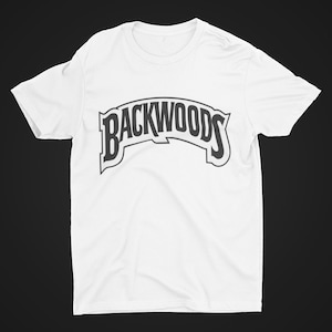 May include: White t-shirt with a black "BACKWOODS" logo printed on the front.