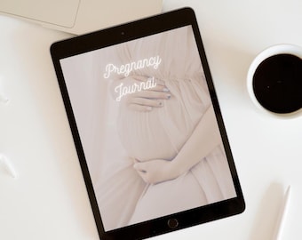 May include: A black tablet computer with a white background showing a pregnancy journal cover. The cover features a pregnant woman's belly with the text "Pregnancy Journal" in white neon lettering. The text "Keep track of the journey" is below the tablet.