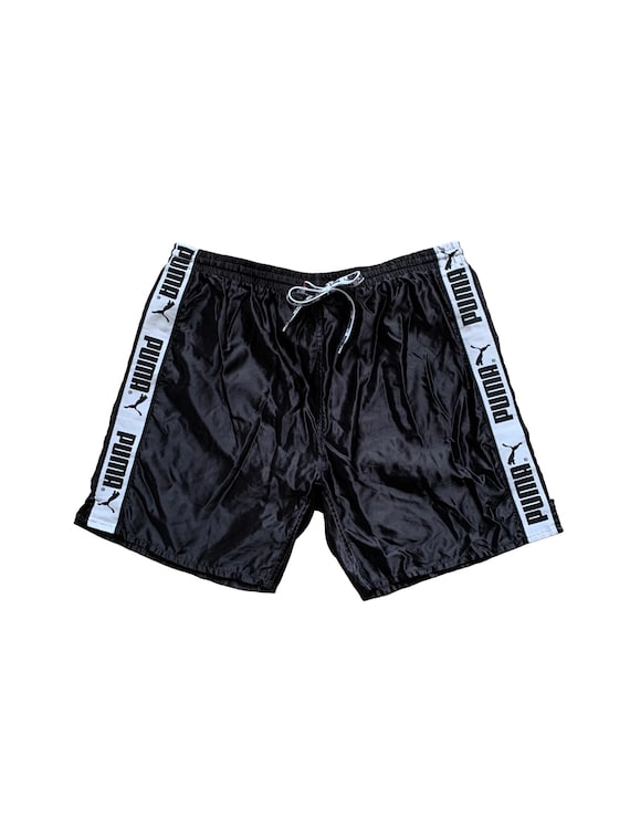 Puma shorts with taped side stripe hotsell