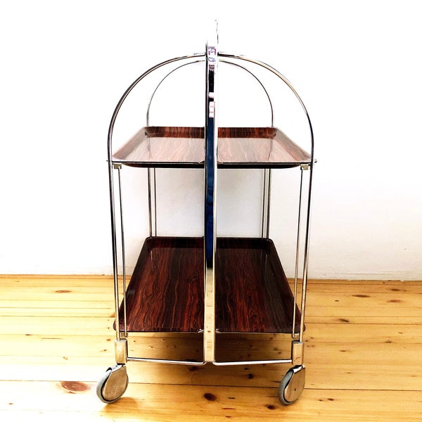 VINTAGE orig. Chariot de service Bremshey DINETT, table d'appoint, étagère, cadre chromé, aspect palissandre pliable, rareté, chariot à thé de bar, MidCentury