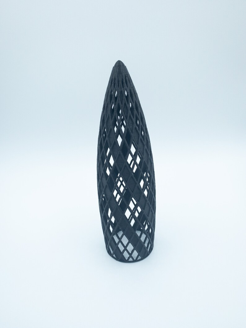 May include: A black 3D printed geometric object with a diamond pattern. The object is shaped like a cone and has a hollow center.