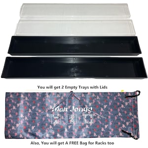 May include: Two black rectangular trays with clear lids are displayed. Below, a drawstring bag with a flamingo pattern and the text "Mah Jongg" is visible. The text "You will get 2 Empty Trays with Lids" and "Also, You will get A FREE Bag for Racks too" are also present.