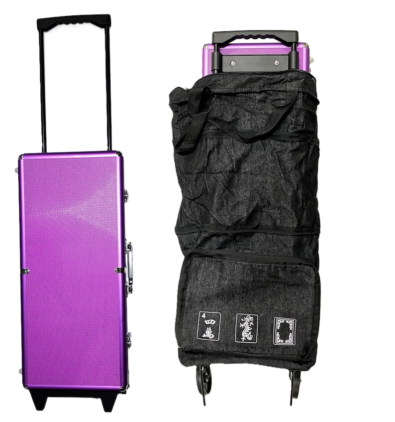 May include: Two rolling suitcases. One is a vibrant purple with a telescoping handle. The other is a black, foldable shopping cart with a black handle and wheels. The cart has three white graphic designs on the front.