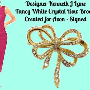 Broche con lazo de cristal blanco de lujo del diseñador Kenneth J Lane para Avon, firmado