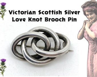 Broche antiguo victoriano escocés de plata con nudo de amor