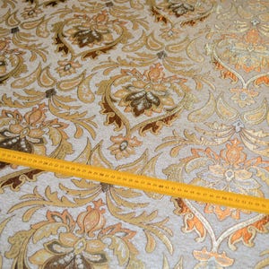Upholstery fabric baroque tendrils vintage woven heavy beige gold brown white