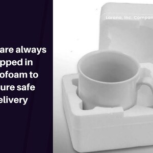 May include: A white ceramic mug with a handle, nestled in a white Styrofoam container. The mug is packaged to ensure safe delivery. Text on the left side of the image reads: "Mugs are always shipped in Styrofoam to ensure safe delivery."