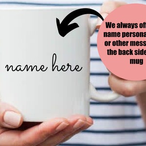 May include: White ceramic mug with the words "name here" in a handwritten font. A pink circle states "We always offer free name personalization or other messages at the back side of the mug."
