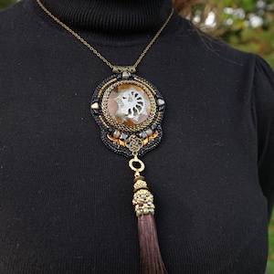 Necklace with ammolite simbircite stone.