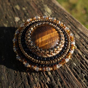 Handmade brooch with tiger eye stone
