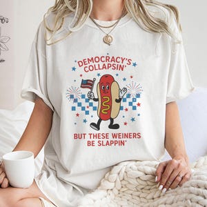 Funny Hot Dog Shirt - Democracy's Collapsin But These Weiners Be Slappin - Patriotic 4th of July Tee