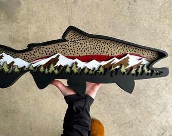 Wood Rainbow trout .Snow capped mountains with pine trees. Fishing and outdoor enthusiasts. Fly fishing. Fishing home decor. Fishing gift