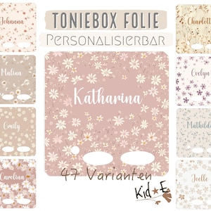 Könnte beinhalten: Ein Set aus drei Keramikbechern mit gesprenkelter, matter Oberfläche. Jeder Becher hat eine andere Farbe: hellblau, cremefarben und grau. Die Becher haben ein schlichtes, modernes Design mit runder Form und bequemem Griff.