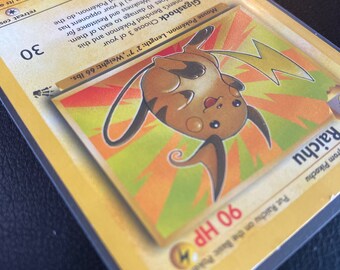 raichu pokemon card value 14/62 Pokémon TCG Raichu #14/62 Unlimited Holo Rare - 1999 Fossil main image 0