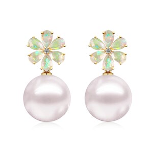 May include: A pair of gold earrings featuring a flower-shaped top set with five pear-cut opals and a small central diamond. A large, round, white pearl hangs from the base of each opal flower, creating a drop design with a polished gold finish.