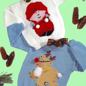 May include: Two knitted sweaters with Christmas themes. One sweater is white with a red and white Santa Claus design. The other sweater is blue with a brown reindeer design.