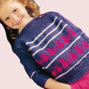 May include: A purple and white striped sweater with pink flower designs. The sweater has long sleeves and a crew neck.