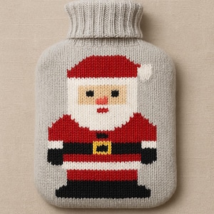 May include: A gray knitted hot water bottle cover featuring a pixelated Santa Claus design. Santa has a red hat and suit, a white beard, and a black belt with a gold buckle. The cover has a turtleneck opening.