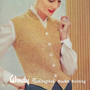 May include: A yellow knitted waistcoat with a V-neck and button fastening. The waistcoat is made using a double knitting technique and has a speckled pattern. The text "Wendy Fashionteck Double Knitting" is visible at the bottom of the image.