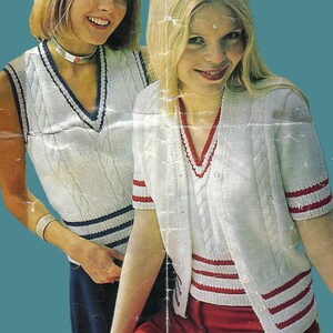 May include: Two women wearing white knit vests and cardigans with cable knit patterns. The vests have navy blue trim, while the cardigans have red trim. The outfits are vintage-inspired and have a sporty aesthetic.