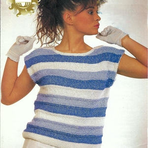 May include: A striped blue and white knit top with a scoop neck and short sleeves. The top is made of a soft, textured yarn.