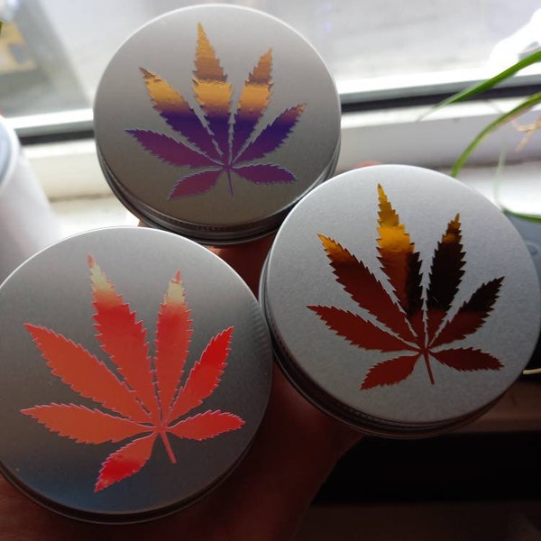 Stash tin - iridescent marijuana leaf design - screw top - weed storage tin. Three colours to choose from