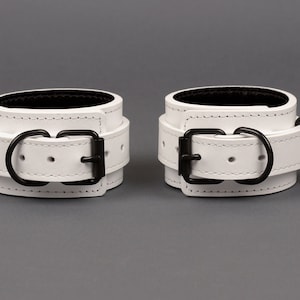 Handmade White leather wrist cuffs for men and women (792 color variations, nickelfree hardware, made to size)
