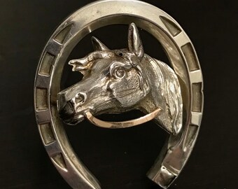 A very Collectible Victorian silver horseshoe brooch with horse’s head.