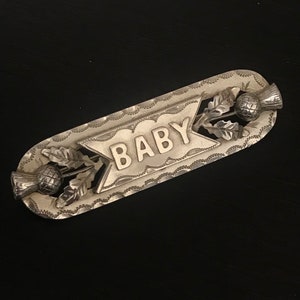 A very attractive Victorian silver “BABY” Brooch.