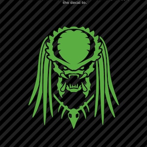 May include: Green Predator alien head silhouette with dreadlocks, a toothy grin, and a necklace.  The background is a striped pattern.
