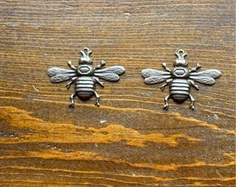 2 elementos de joyería con forma de abeja de latón natural