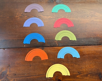 9 figuras troqueladas de arcoíris de colores surtidos