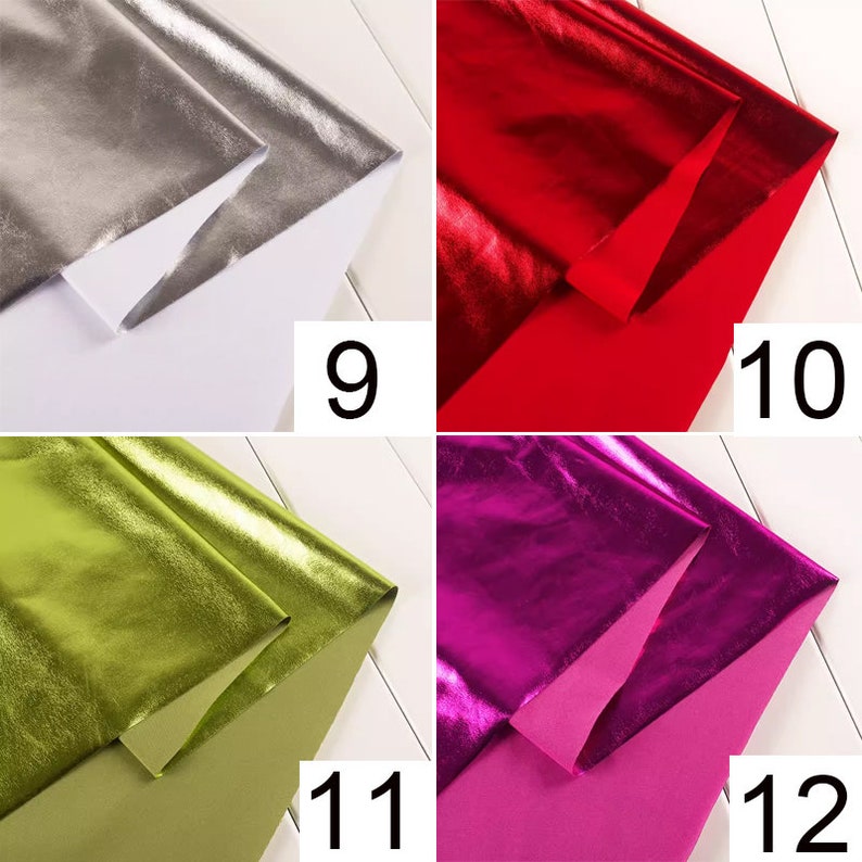 May include: Four samples of metallic fabric in different colors: silver, red, green, and purple. Each fabric sample is folded in half and shows the metallic side and the back side.