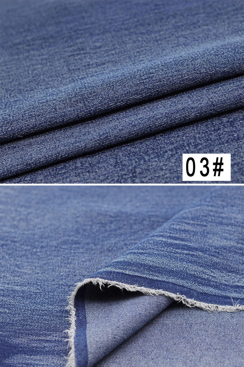 Puede incluir: Primer plano de una tela vaquera azul con un tejido texturizado. La tela est&aacute; doblada, mostrando el borde sin terminar. El texto "03#" es visible en la esquina superior derecha de la imagen.