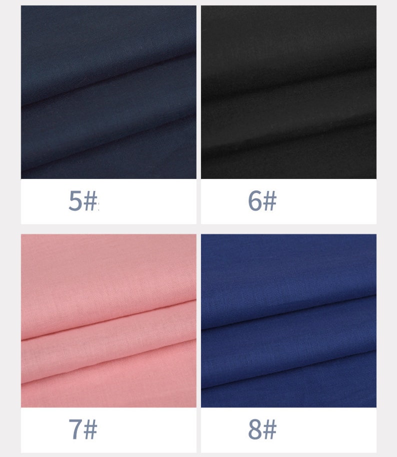 May include: Four fabric swatches in different colours. The swatches are arranged in a grid of two rows and two columns. The top left swatch is a dark blue fabric. The top right swatch is a black fabric. The bottom left swatch is a light pink fabric. The bottom right swatch is a dark blue fabric.