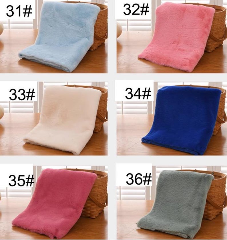 Peut inclure: Six &eacute;chantillons de tissu en fausse fourrure de diff&eacute;rentes couleurs dispos&eacute;s sur un panier en osier. Les couleurs sont bleu clair, rose, blanc, bleu, rose et gris. Chaque &eacute;chantillon est &eacute;tiquet&eacute; avec un num&eacute;ro&nbsp;: 31&nbsp;#, 32&nbsp;#, 33&nbsp;#, 34&nbsp;#, 35&nbsp;# et 36&nbsp;#.