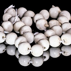 A Short Strand of 6 Antique European Matte White Beads from the African Trade VB_0375