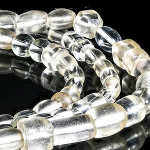 A strand of Antique Bohemian Crystal Clear Mostly Oval African Trade Beads