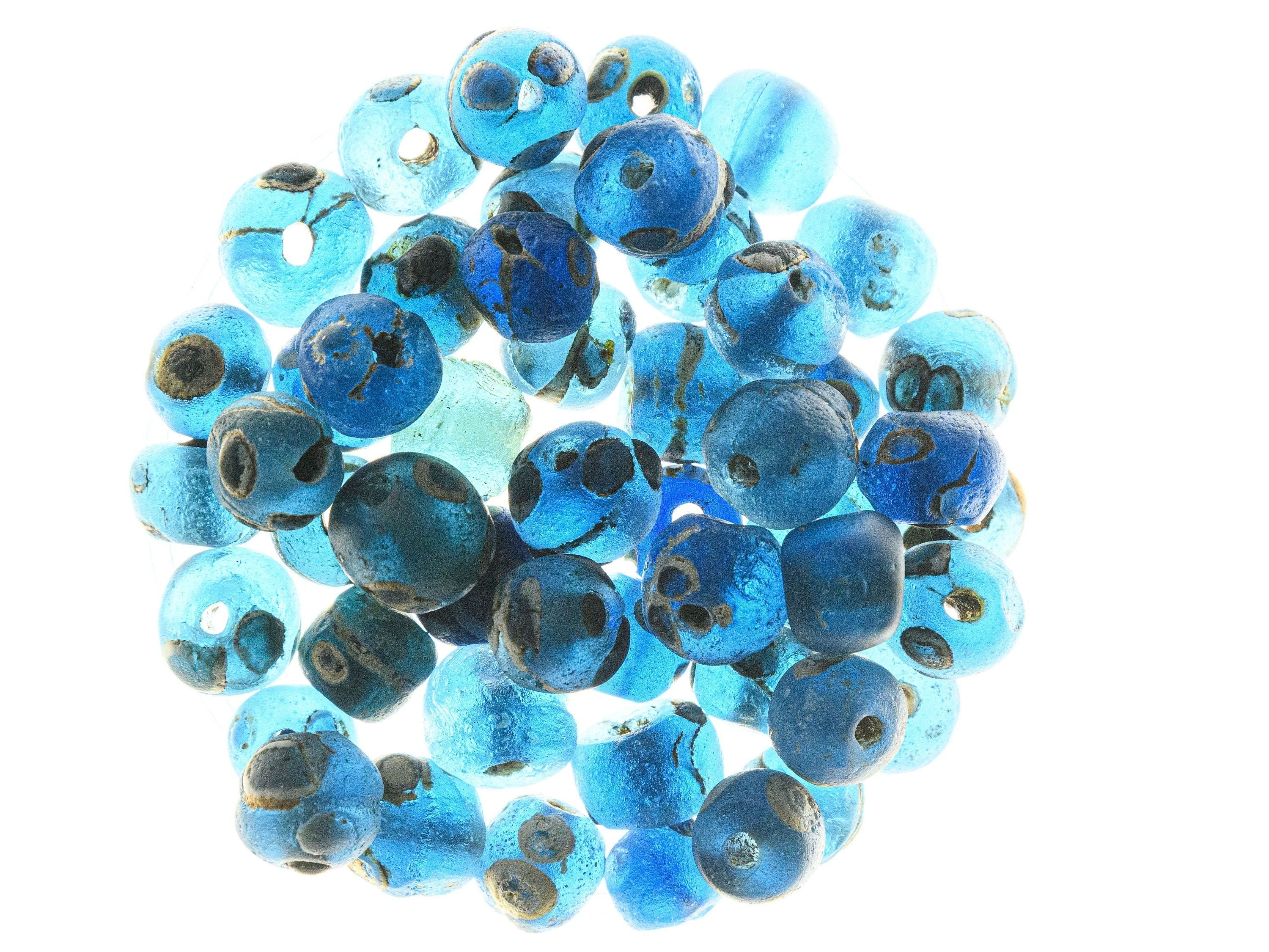 Short Strand of 10 Small Ancient Islamic Glass Evil Eye Beads from