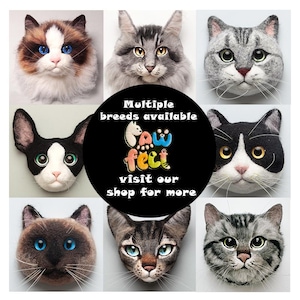 May include: A collection of felted cat faces in various breeds, including Ragdoll, tabby, and Siamese. The image features a central black circle with the text "Multiple breeds available" and "Paw Feet" logo, inviting viewers to visit the shop.