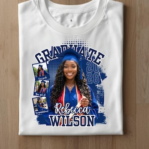 May include: White t-shirt featuring a graduation design. The design includes the word "GRADUATE" in navy blue, the year "2026", and the name "Rebecca Wilson". It also has three small photos of a graduate in a cap and gown.