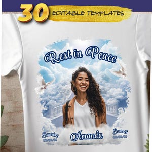 May include: A white t-shirt with a photo of a woman in front of a cloudy sky with the words "Rest in Peace" and "Amanda" printed on it. The dates "00/00/00" are printed below the words "Sunrise" and "Sunset".
