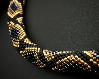 Schwarzer Slangenkettchen. Slang Halsband. Cadeau slangliefhebber