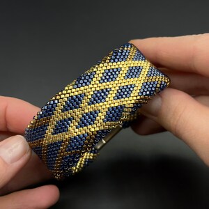 Blue gold wide geometric bracelet. Chunky bead bangle