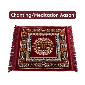 May include: A square, burgundy meditation asana with a detailed central design in gold, white, and brown. The border features a repeating geometric pattern and fringe. The text "Chanting/Meditation Aasan" is displayed at the top.