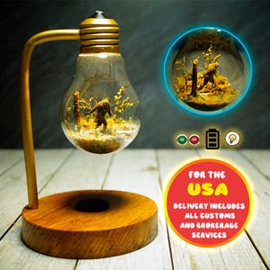 Diorama, bigfoot. Miniature bigfoot diorama in a lamp.