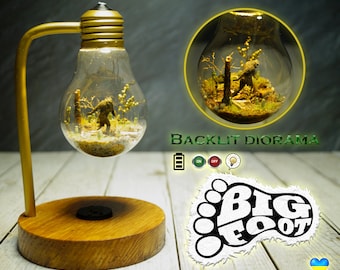 Diorama, bigfoot. Miniature bigfoot diorama in a lamp.