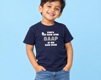 May include: A navy blue short-sleeved t-shirt featuring white and grey text that reads SUNTA TOH MAIN APNE BAAP KI BHI NAHI HOON, with a small white graphic icon of a lion head positioned above the first line of the printed text on the chest.