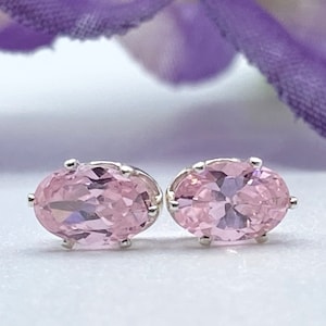 Beautiful Pink Tourmaline stud earrings in sterling silver. October Birthstone 7 X 5 m oval stone.  Gift packaged and ready for gift giving.