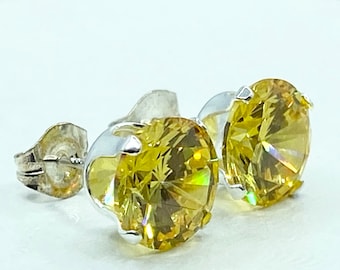 Beautiful huge Yellow stud earrings.   8mm round Yellow gemstones set in sterling silver. Gift packaged and ready for giving.